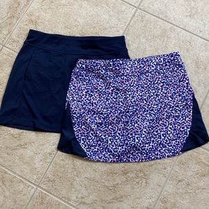TWO PGA store golf skorts. Medium.